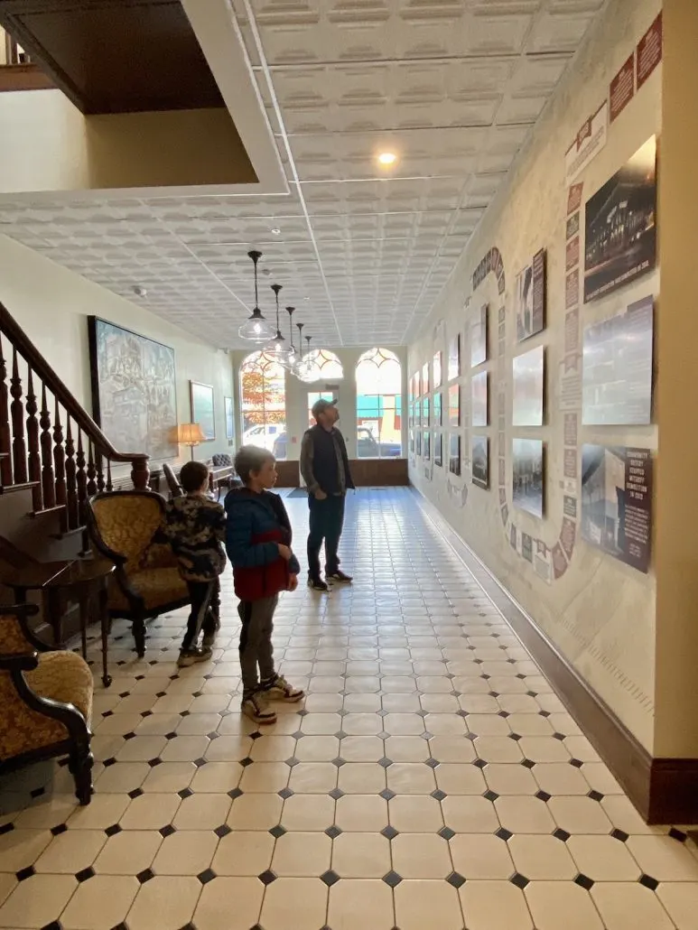 Two boys and father checking out the Mithoff Building in downtown Lancaster.
