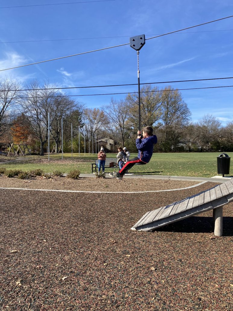Boy on zip line at McCord Park in Worthington, Ohio.
