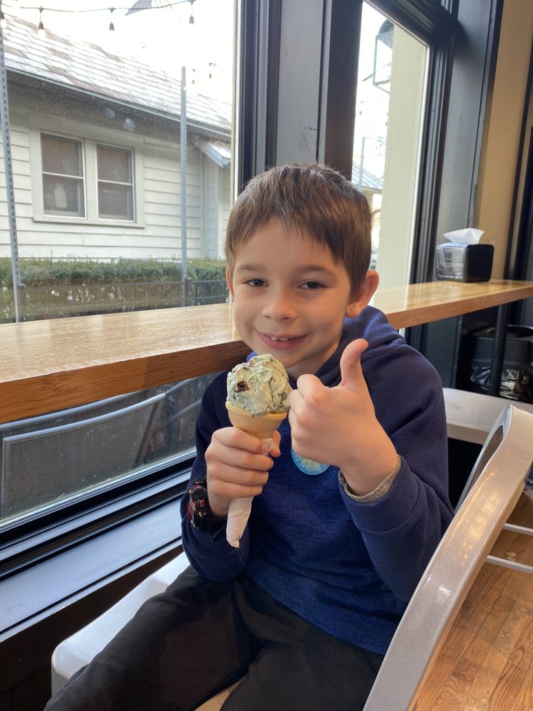 A boy eating an ice cream cone at Johnson's Ice Cream in historic downtown Dublin, Ohio.