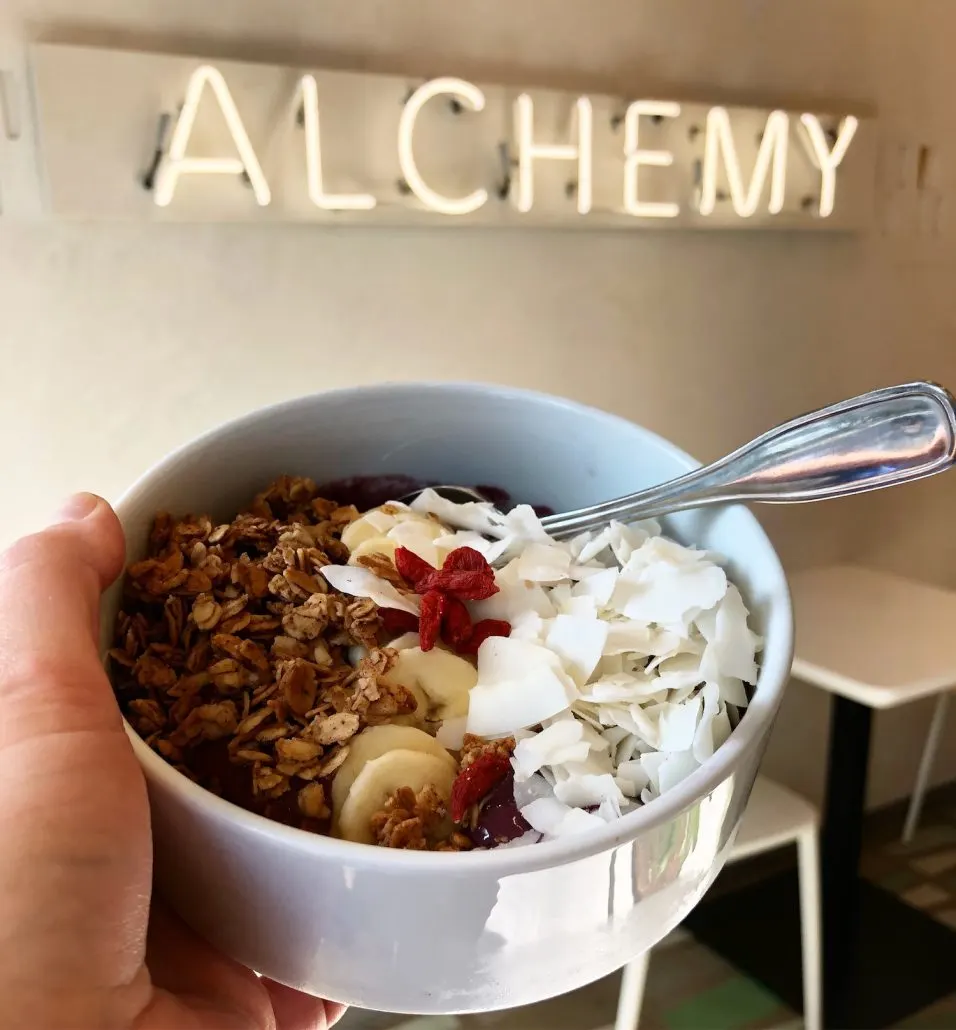 A smoothie bowl with granola, fruit and coconut at Alchemy in Grandview.