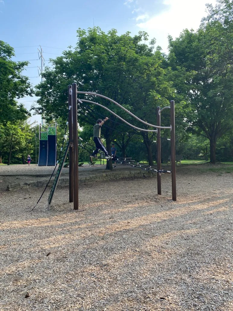 A boy on the Elevate Fitness Course at Homestead Park.