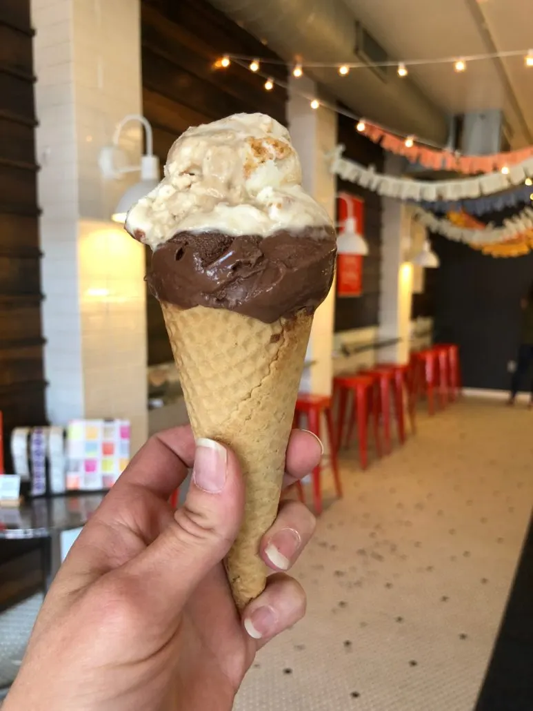 Two scoops of ice cream on a cone at Jeni's in Grandview.