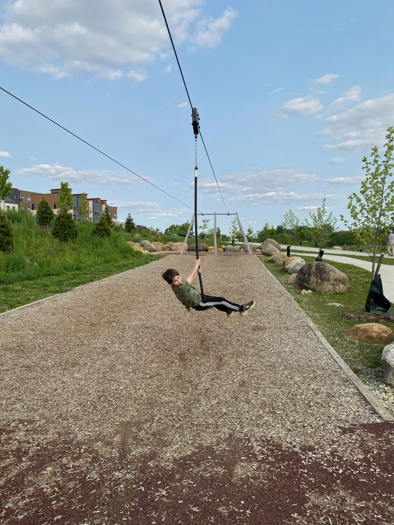 A boy on the zip line at Quarry Trails Metro Park.