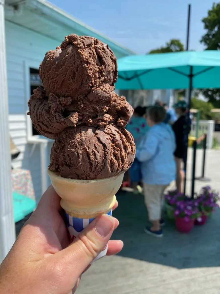 A chocolate ice cream cone outside of the Put in Bay Candy Bar.