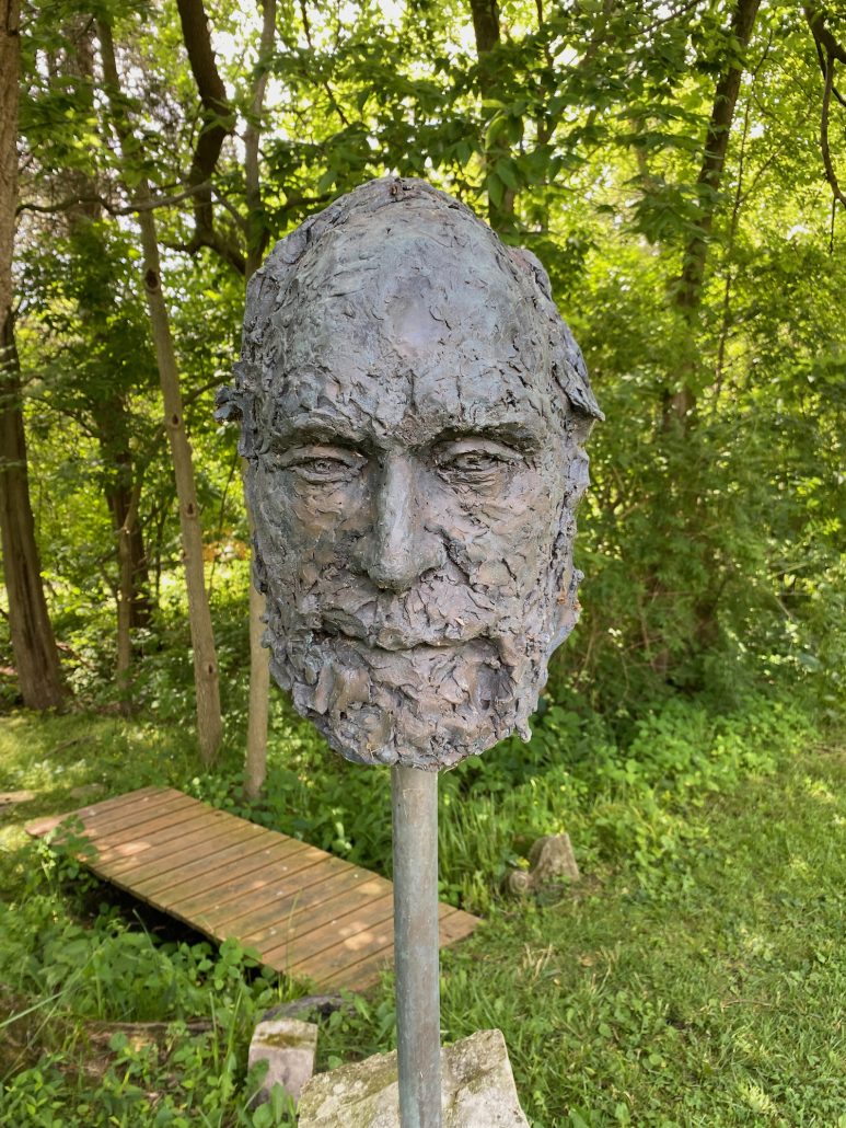 A sculpture of a face at Charles Herndon Gallery.