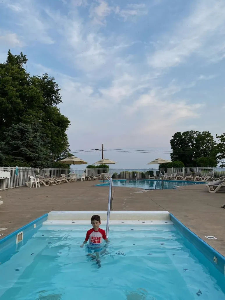 A boy in the pool at Kelleys Island Venture Resort.