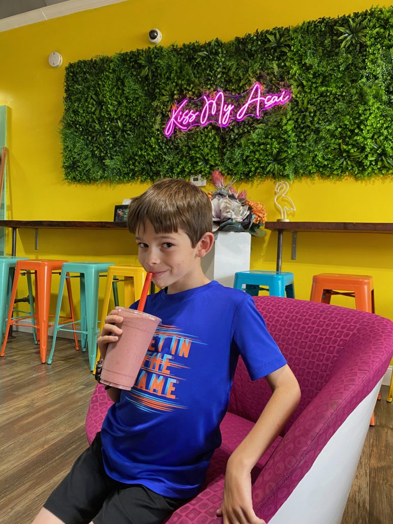 Boy drinking a smoothie at Downtown Fruit Passion in Lancaster, Ohio.
