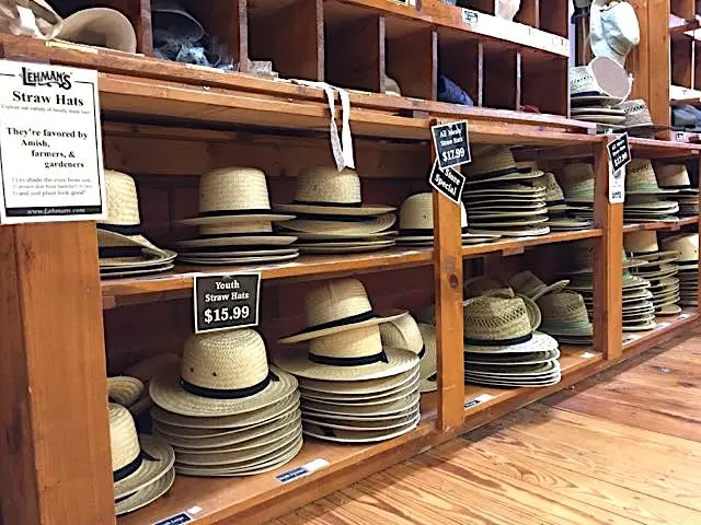 A row of straw hats at Lehman's Hardware in Kidron, Ohio.