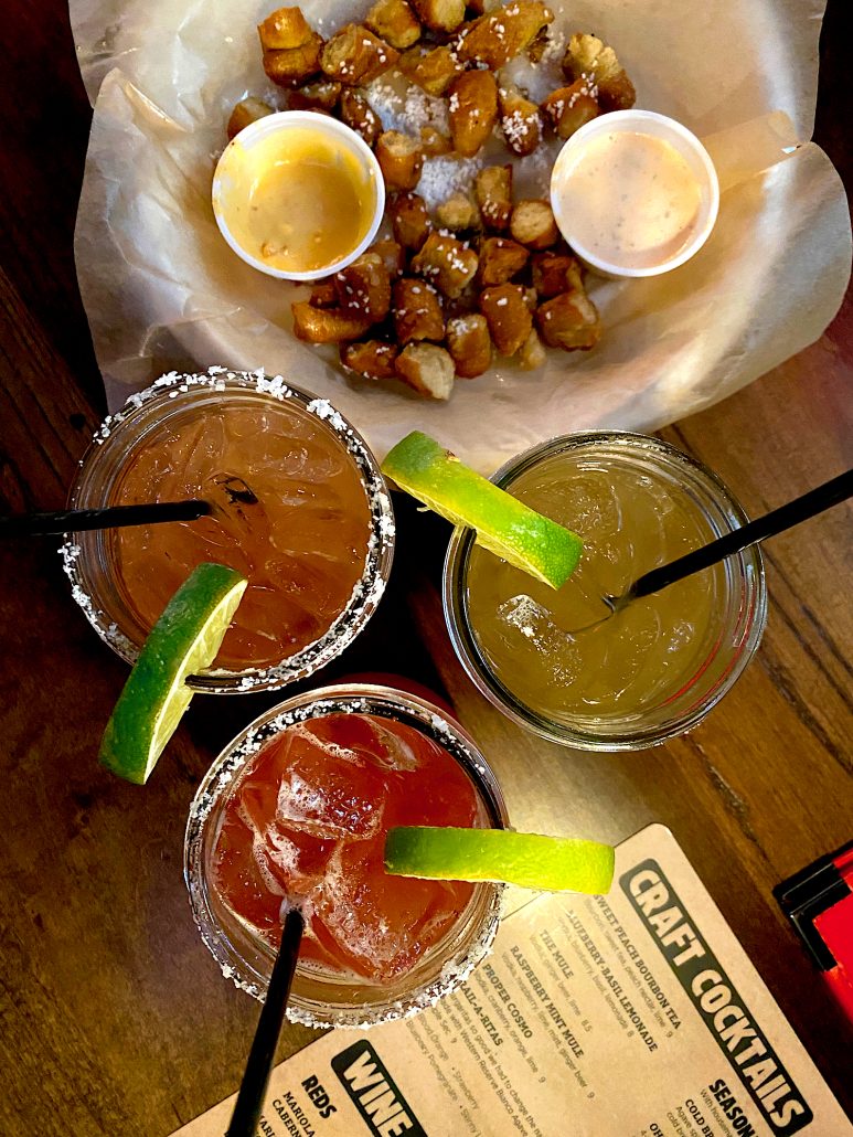 Three drinks and pretzel bites from the Happy Hour Menu at The Rail in Grandview.