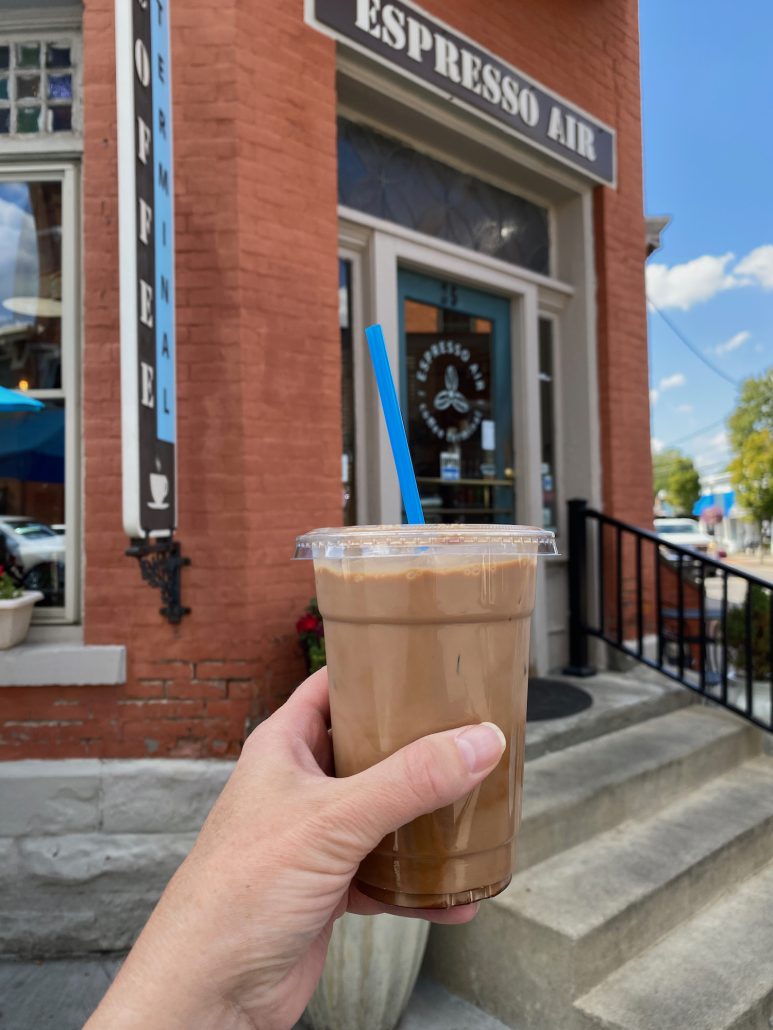An iced Mocha in front of Espresso Air Coffee shop.