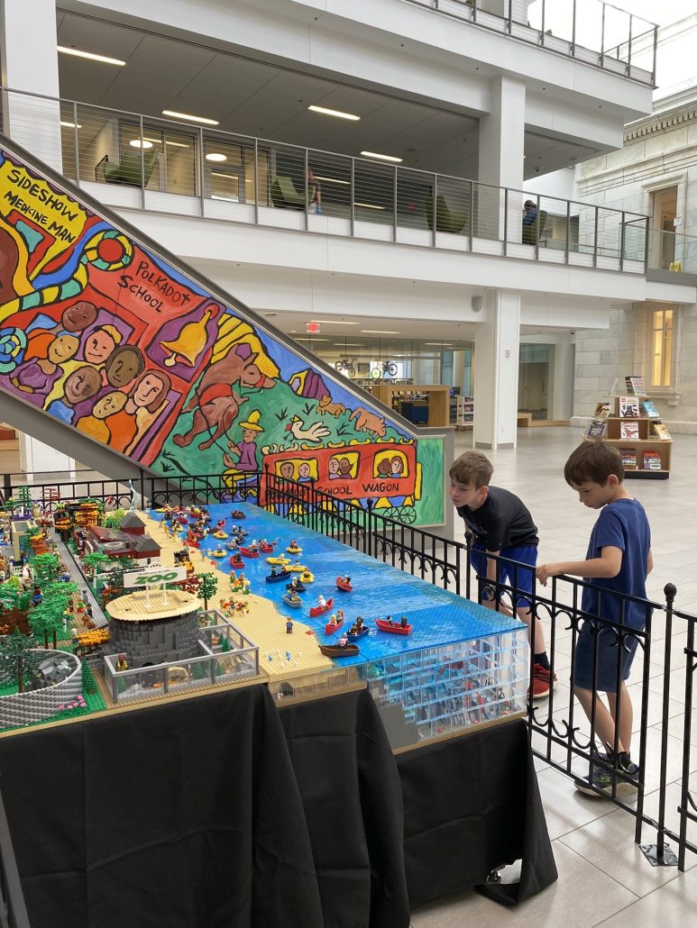Two boys looking at a LEGO display at the Columbus Metropolitan Library in Ohio.