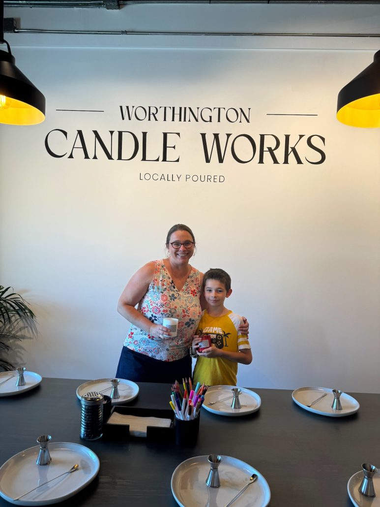 A mom and son with their finished candles at Worthington Candle Works.