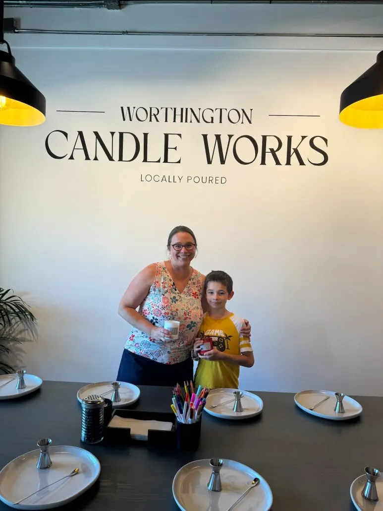 A mom and son with their finished candles at Worthington Candle Works.