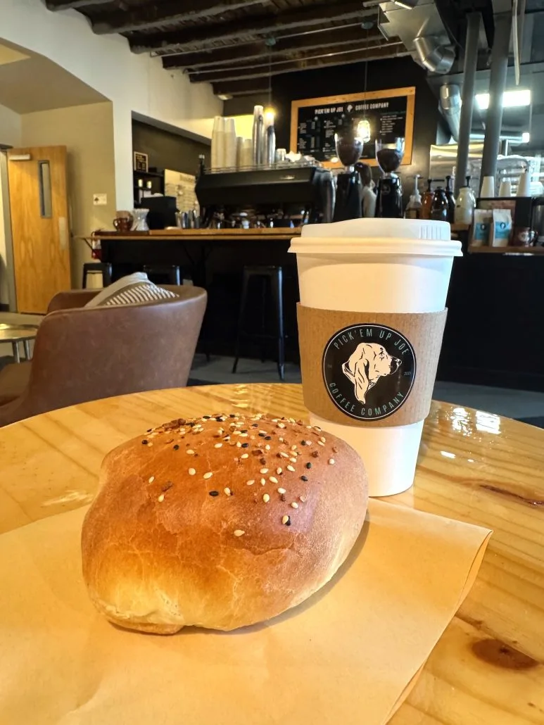 Discover the charm of Grove City, Ohio! From grabbing a cup of coffee in Grove City Town Center to having outdoor adventures at Scioto Grove Metro Park, there's something for everyone. Plan your perfect day in Grove City now! #GroveCityOhio #ExploreLocal #TravelOhio Coffee and ham and cheese kolache from Pick em up Joe in downtown Grove City.