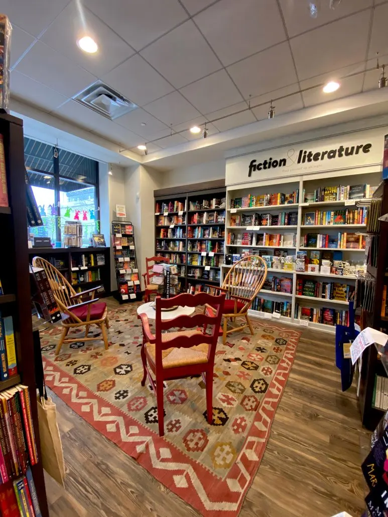 A seating area and shelves full of books at Gramercy Books in Bexley.