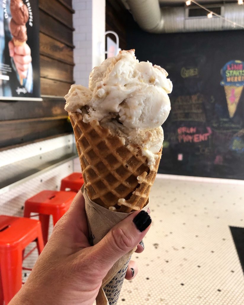 A waffle cone filled with hand-dipped ice cream at Jeni's Splendid Ice Creams.