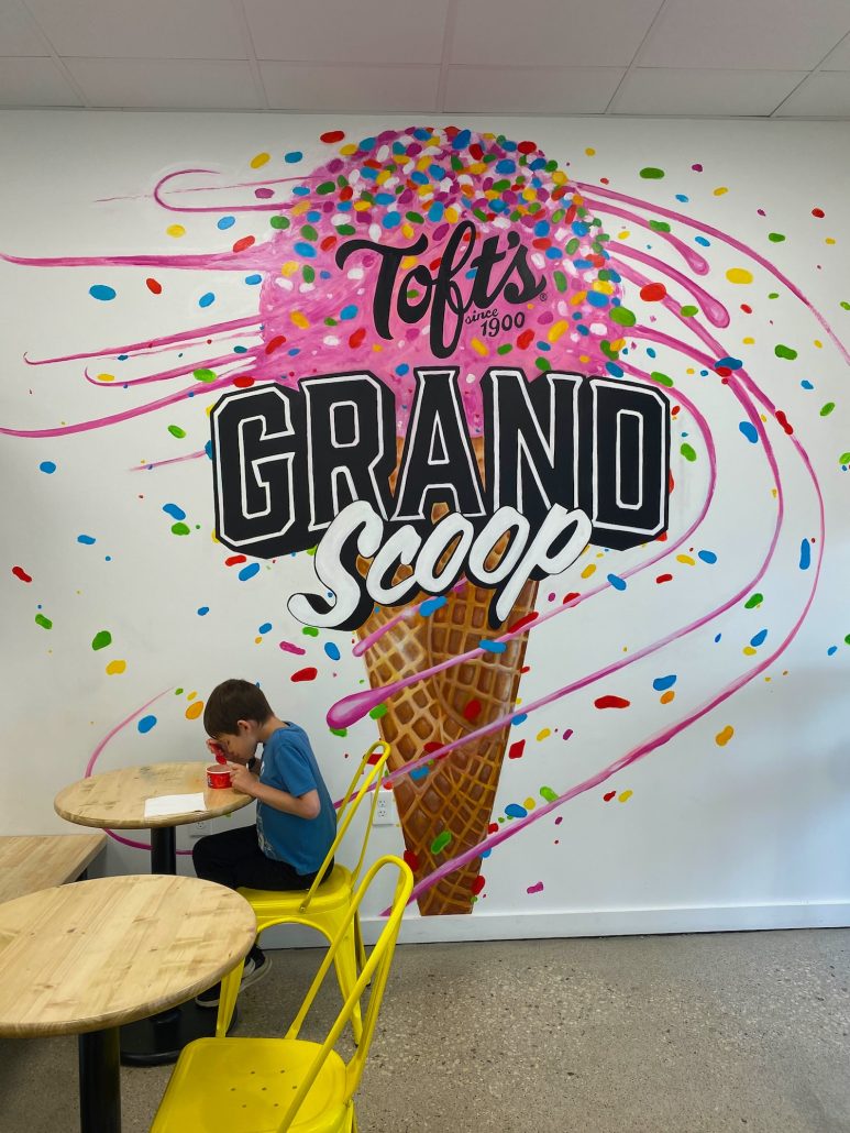 A boy eating ice cream at Toft's Grand Scoop in Grandview Heights.