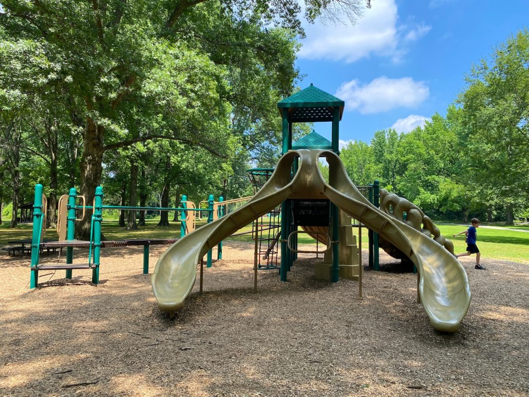 A playground structure with a double slide.