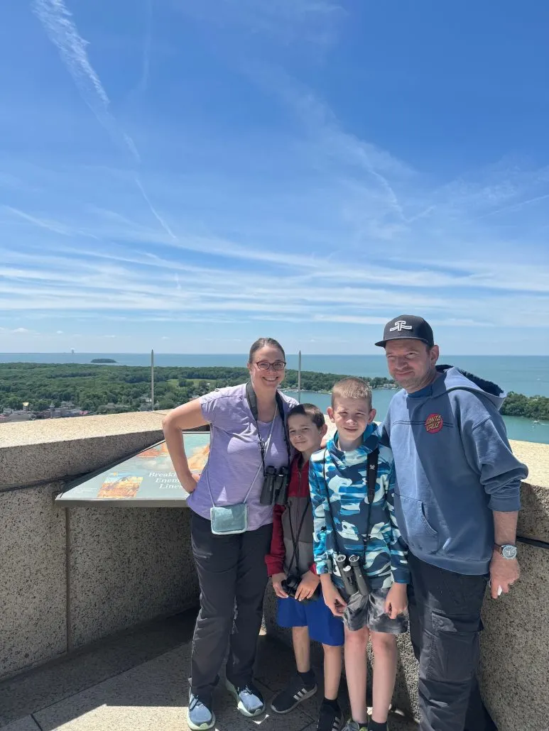 A family at the top of Perry's Monument at Put-in-Bay.