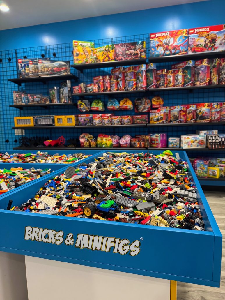 A table of LEGO bricks and sets for sale at Bricks and Minifigs Westerville.