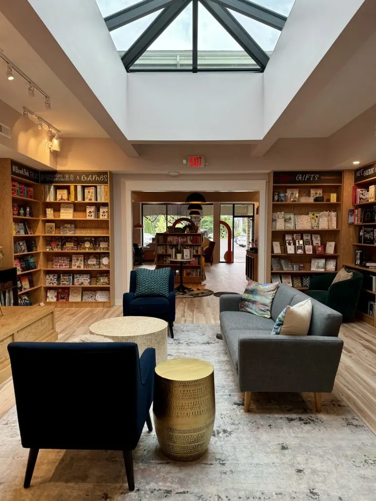 A seating area surrounded by bookshelves at Storyline Bookshop in Upper Arlington.