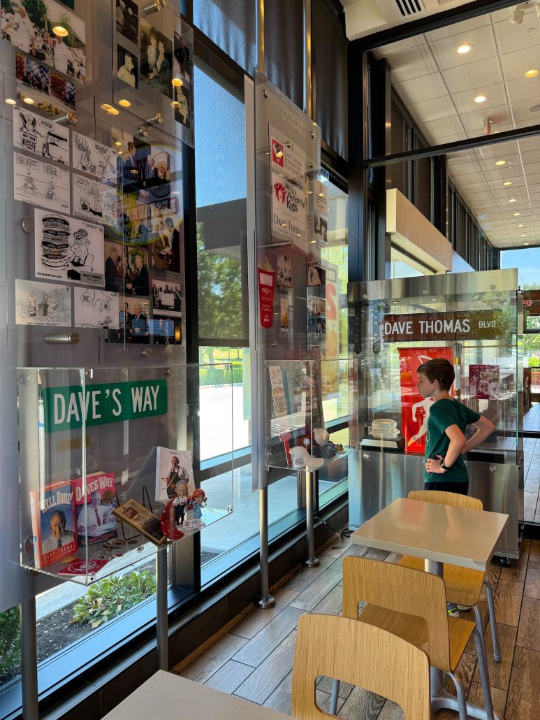 A boy looking at Wendy's memorabilia at the Wendy's Flagship Store in Dublin, Ohio.