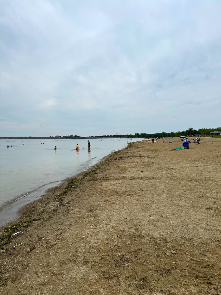 Beachgoers at Alum Creek State Park Beach in Delaware, Ohio.