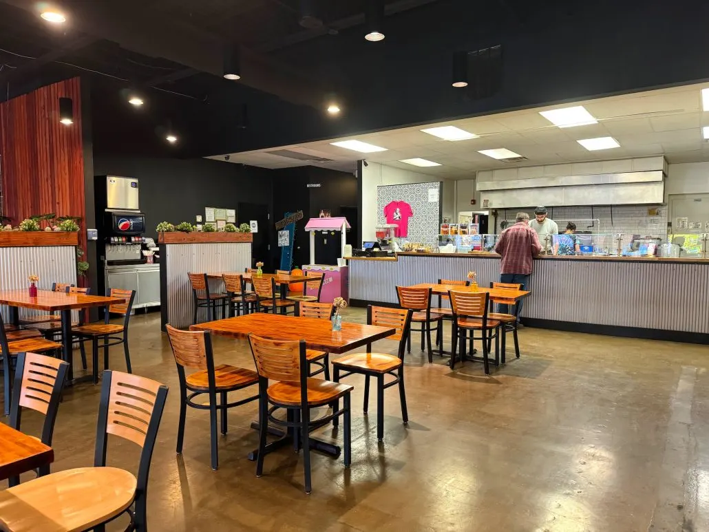 The seating area and counter where you order at Maya Burrito in Logan, Ohio.