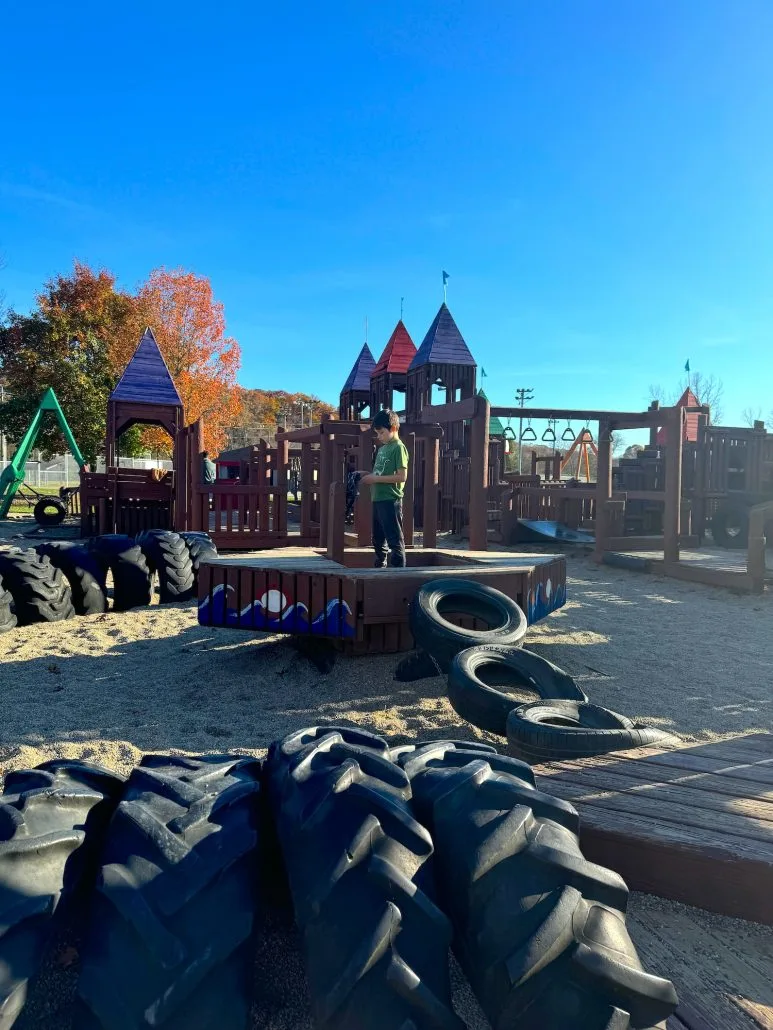 Boy on a playground at Mingo Park in Logan, Ohio.