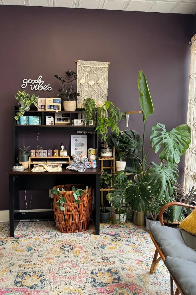 Plants and decor inside Village Massage Co in Plain City.