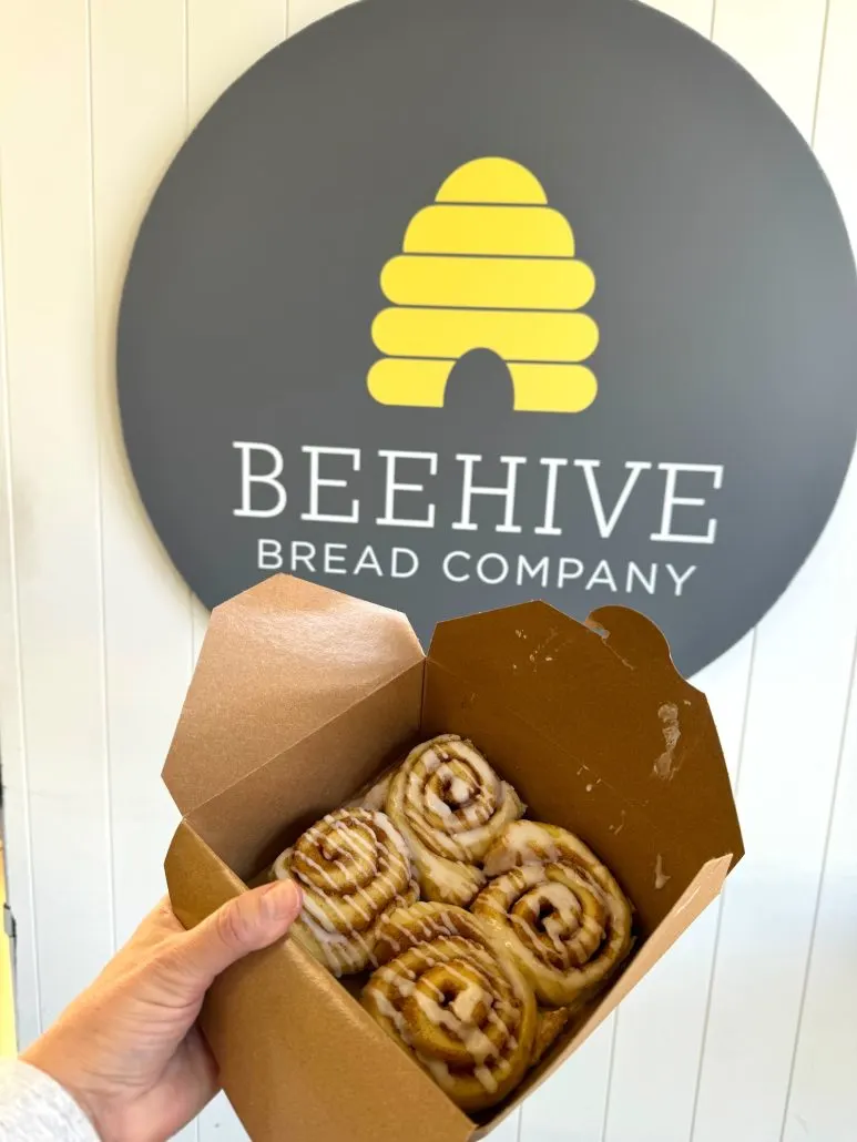 A box of four mini cinnamon rolls from Beehive Bread Company.