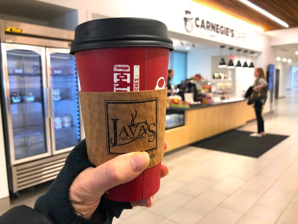 A to-go-cup of coffee at Carnegie's Cafe.