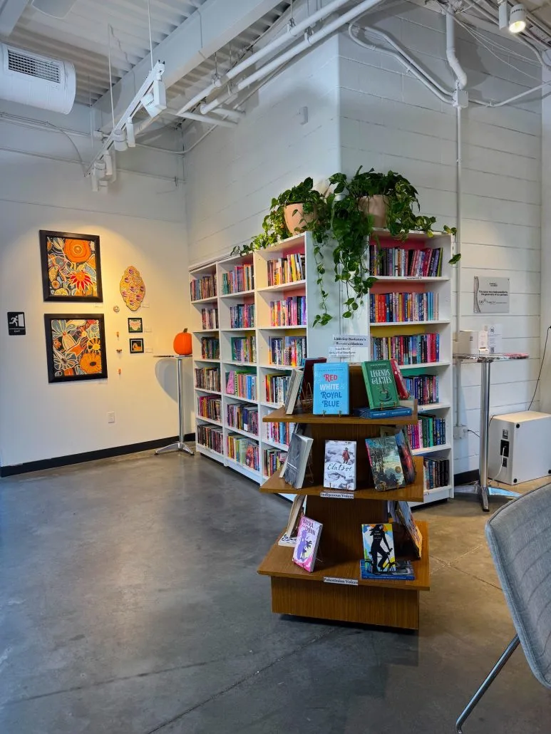 Books and art on display at The Little Gay Bookstore in Columbus, Ohio.