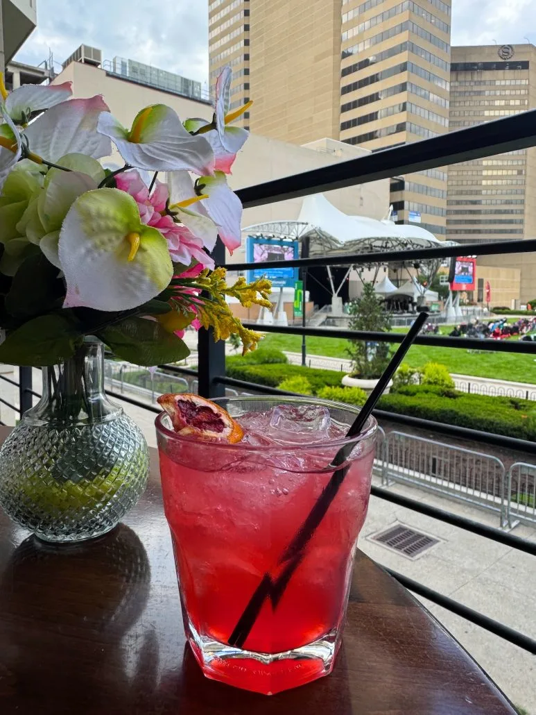 A cocktail on a table at The Spaghetti Warehouse overlooking Columbus Commons.